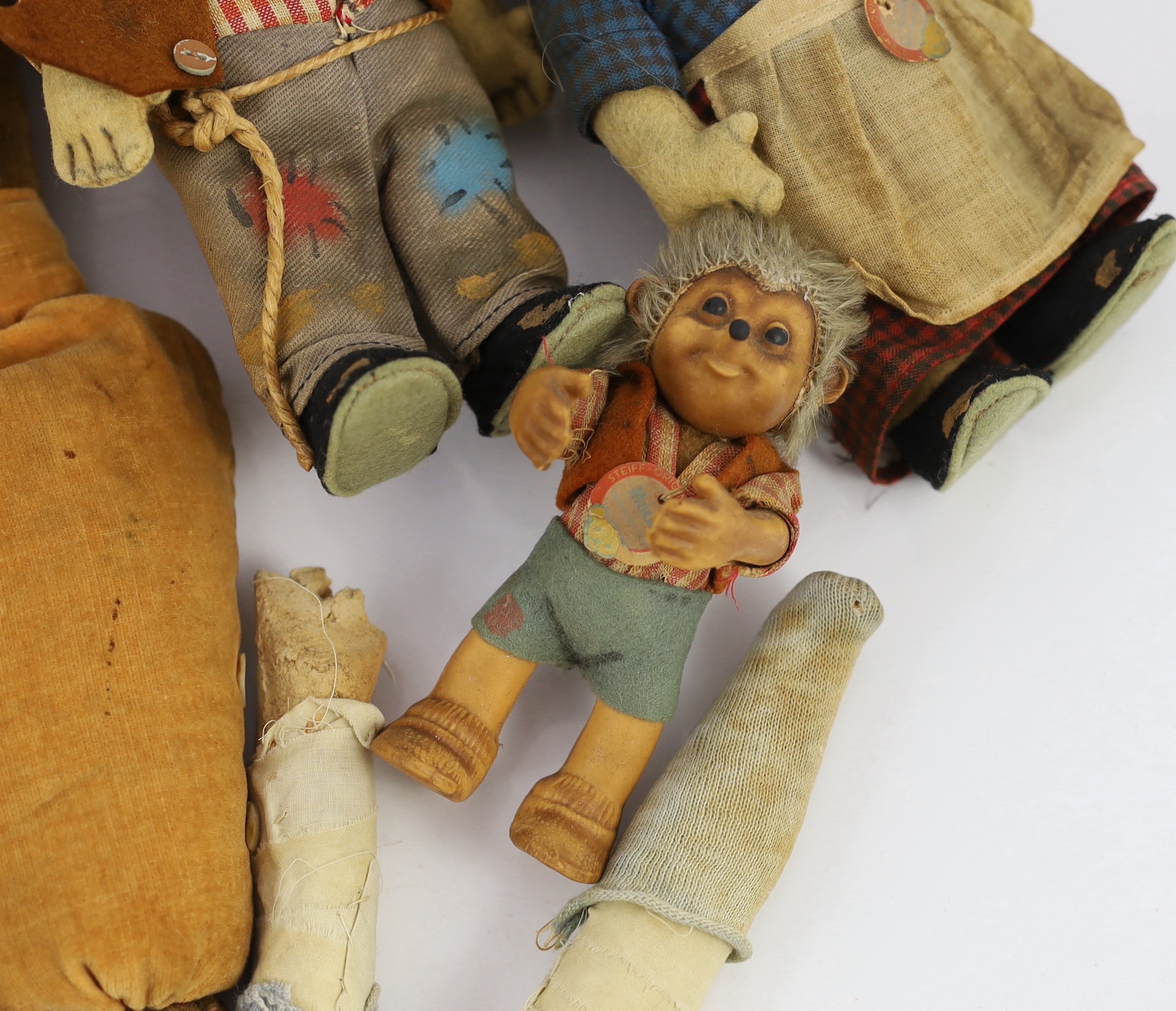 A Norah Wellings-type South Sea Island doll, 13in., three Steiff puppets, Japanese gofun doll, etc.